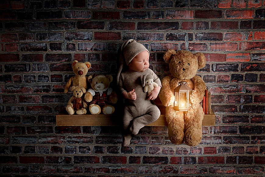 Digital composite photo of a newborn on a wooden shelf with teddy bears at rachael phillips photography in mansfield, nottingham