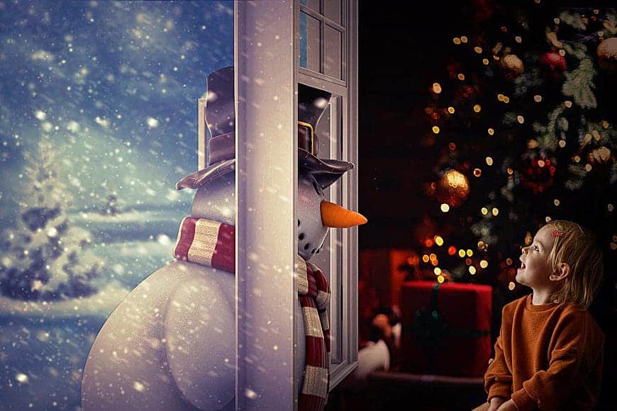 christmas backdrop with a snowman and a little girl