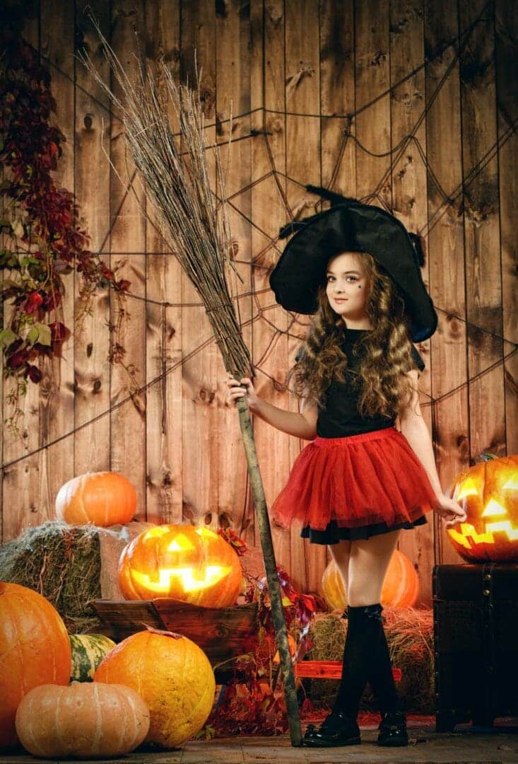 girl dressed as a witch for halloween