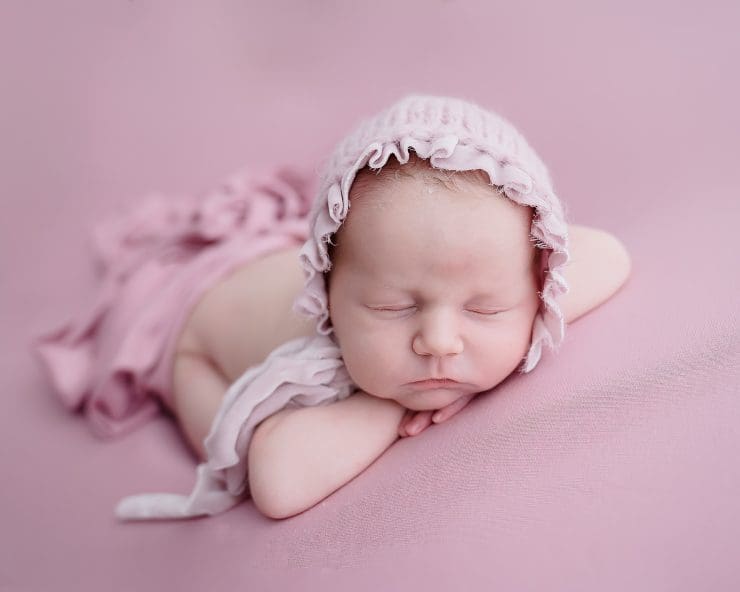 baby ada rose on pink blanket and hat on