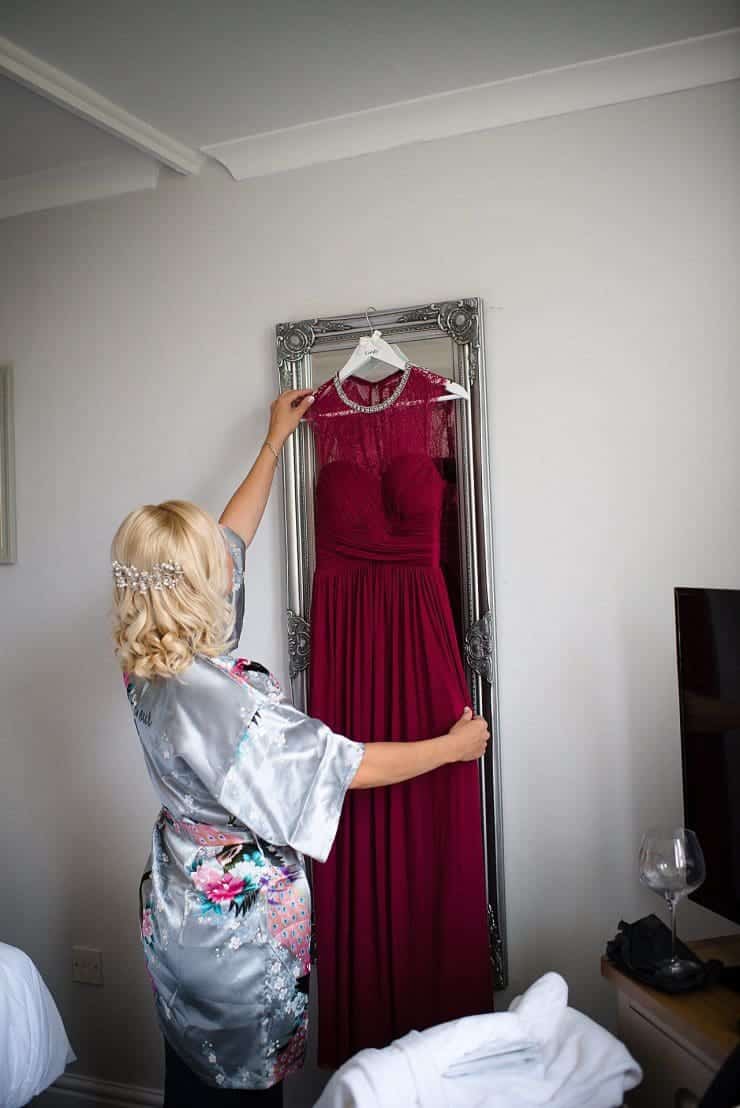 bridesmaid checking her dress out