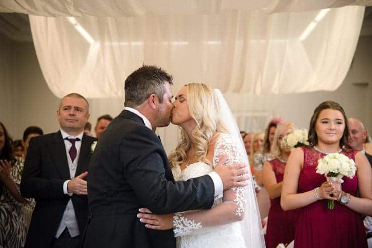 first married kiss at the altar