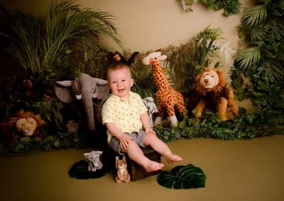 Bradley at his cake smash session with a jungle theme