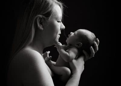 black and white mum with Newborn baby posing