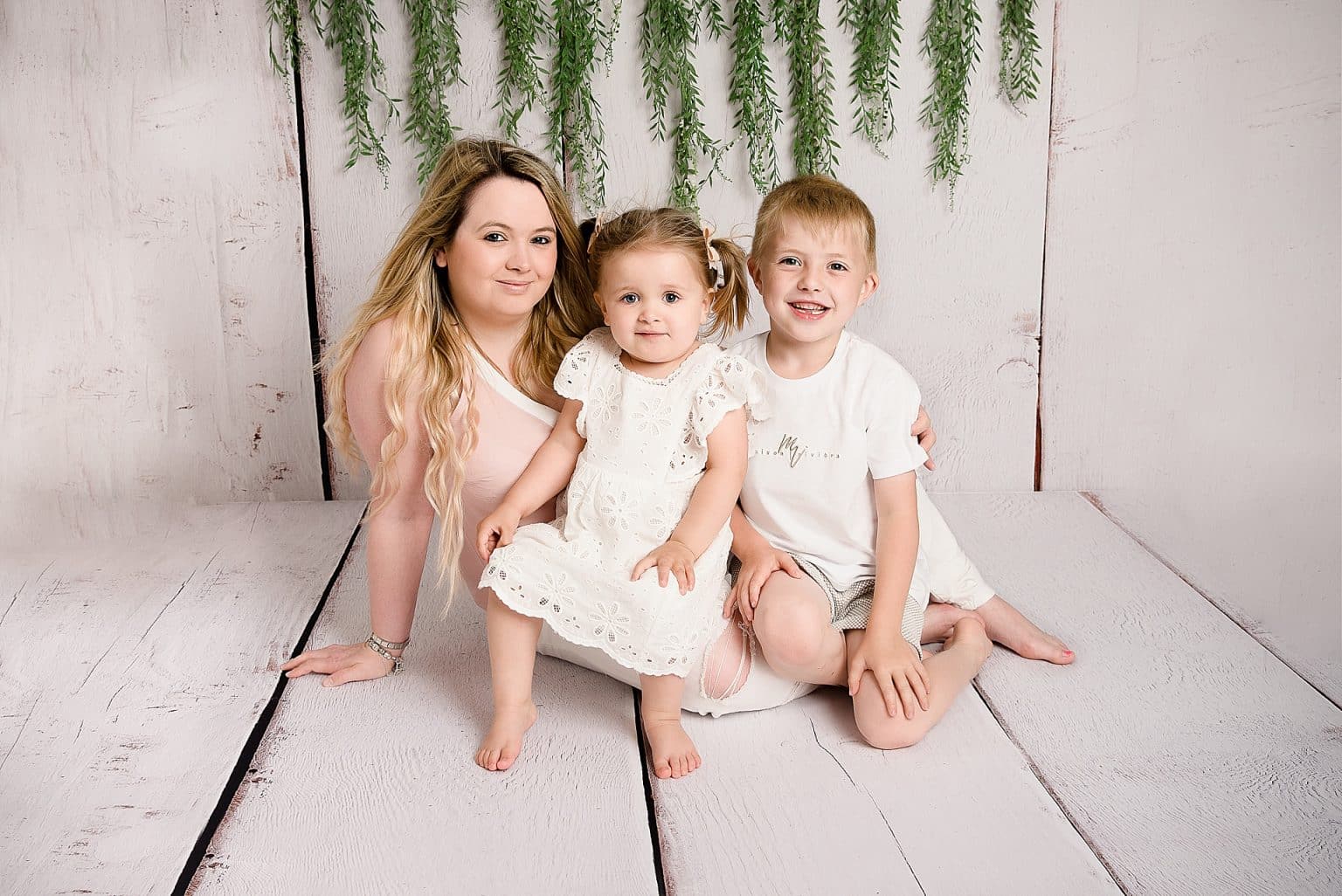 mummy and me photo shoot where mum is together with her two children