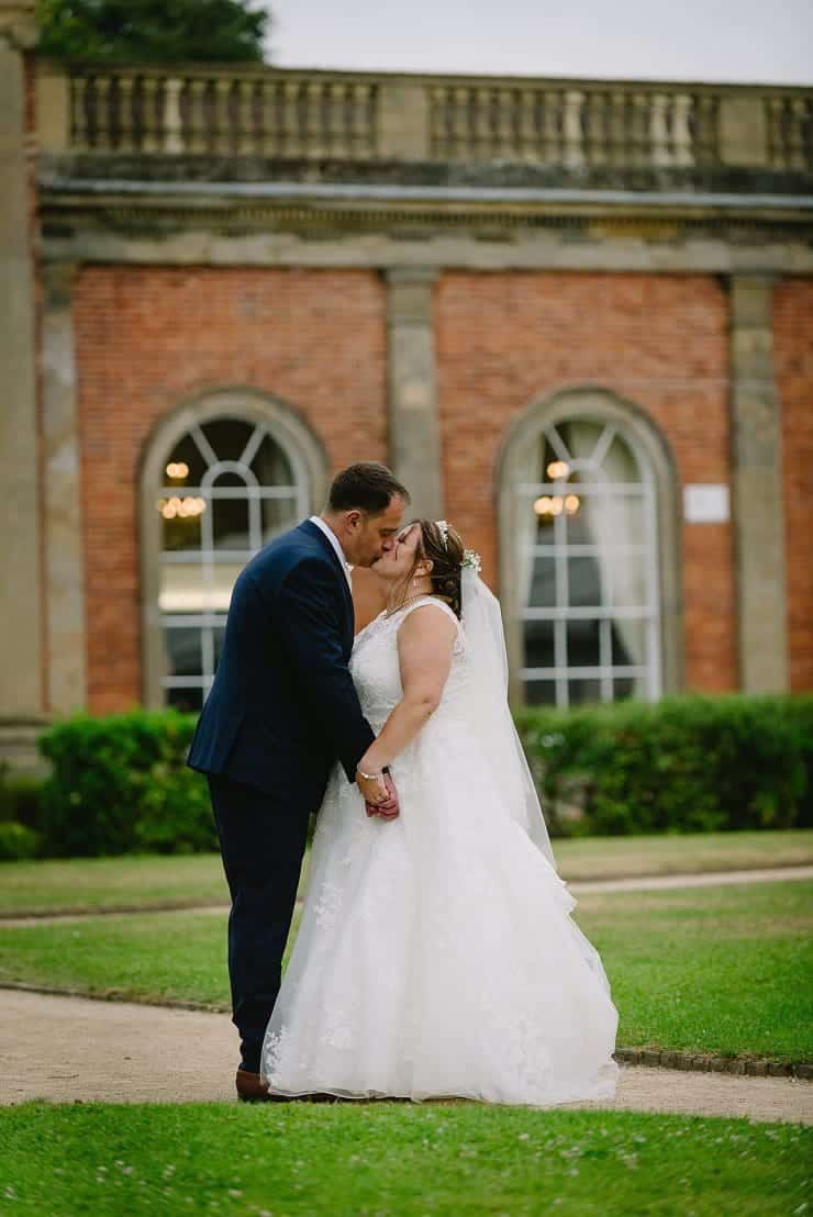 kissing bride and groom at Colwick hall nottingham