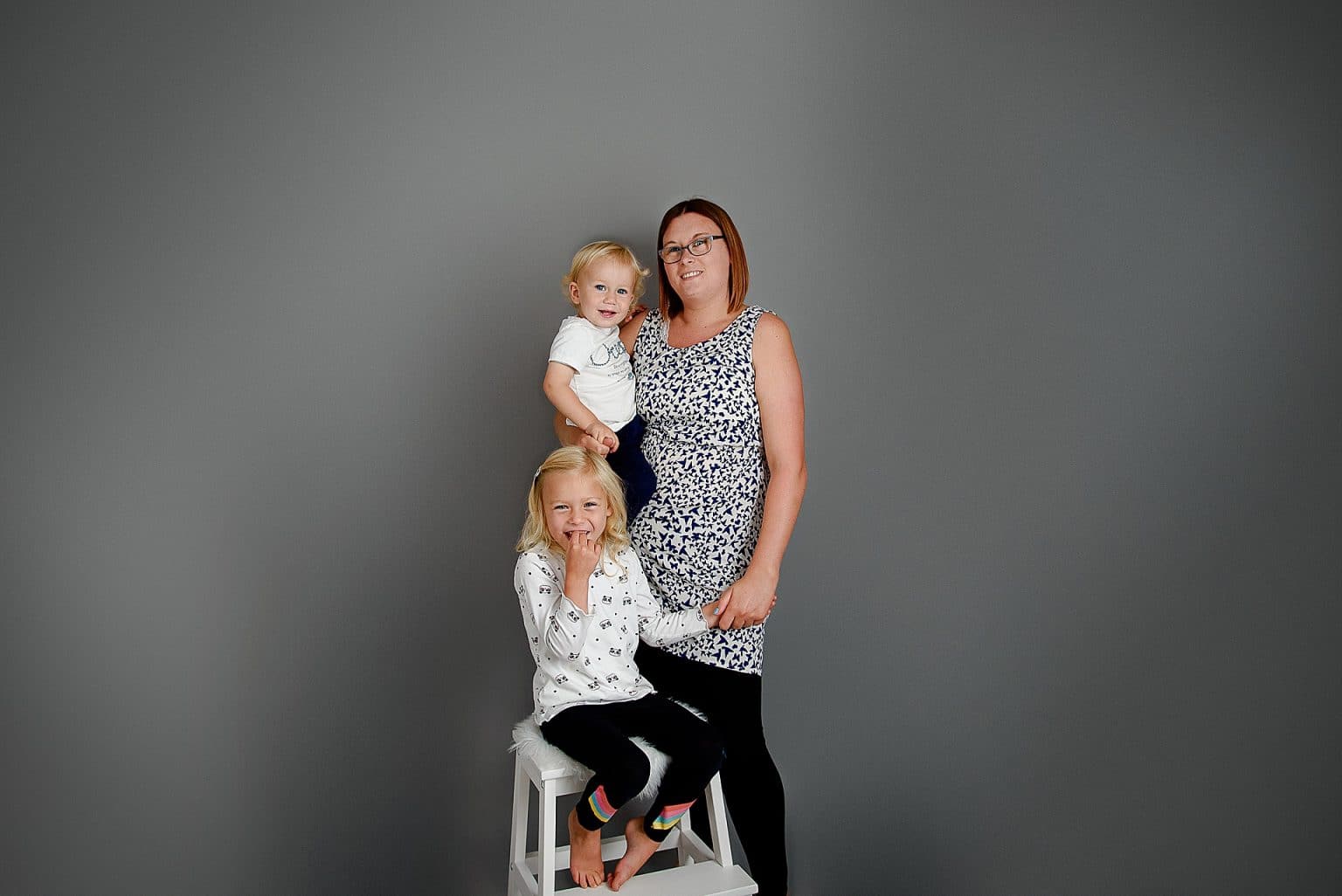 mummy and me photo shoot where mum is together with her two children