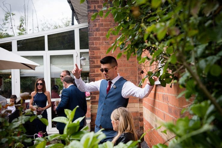 candid photo of wedding guest in nottingham