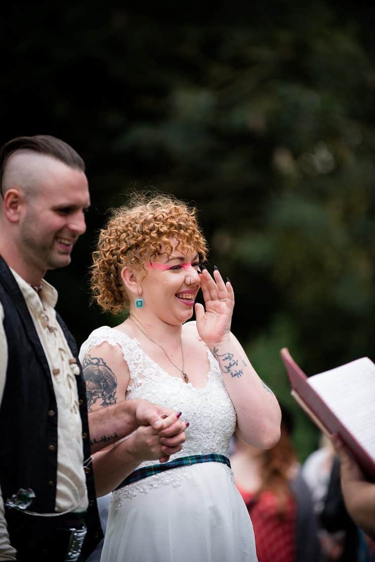 bride laughing with groom at eastwood hall in nottingham