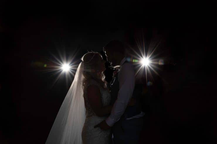 beautiful portrait photos of the bride and groom with star burst flash at the white hart moorwood hotel nottinghamThe White Hart Inn Hotel, Nottingham wedding photographer - Rachael Phillips Photography