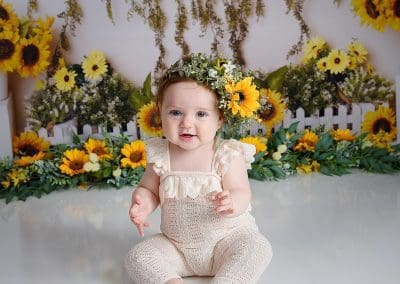 sunflower sitters session is so cute, little girl with halo on her head