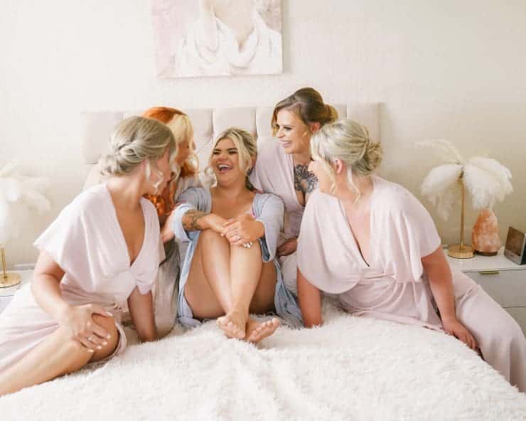 bride with her bridsmaids all laughing - Rachael Phillips Photography - Nottingham and Derby Wedding Photographer.