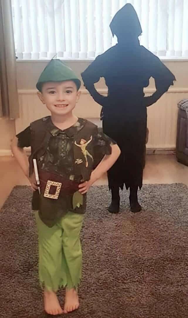 Boy dresses up as peter pan and his sister dresses as his shadow 