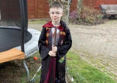 young lad dressed up as harry potter for world book day