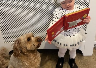 little girl and her dog all dressed up for world book day