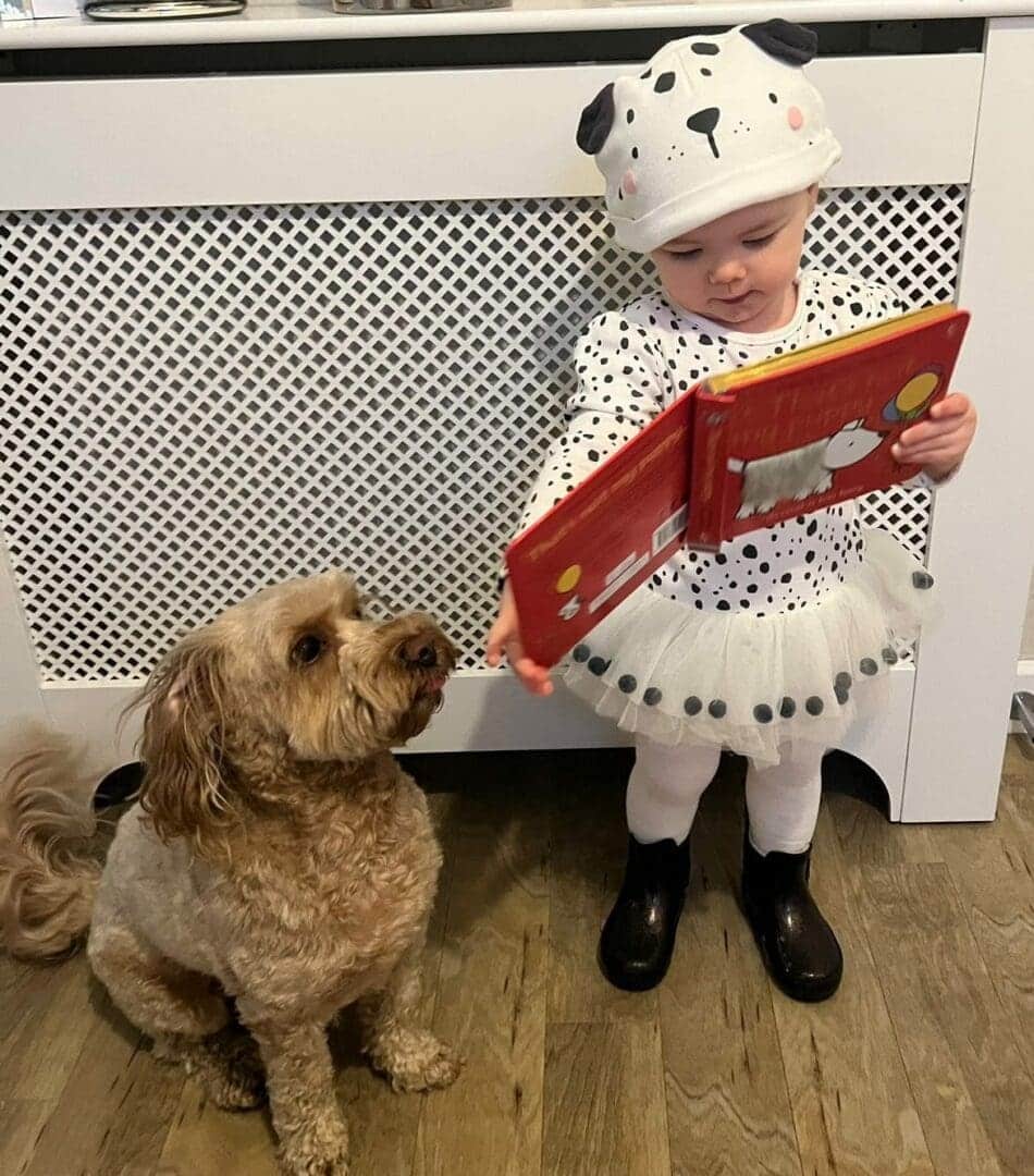 little girl and her dog all dressed up for world book day