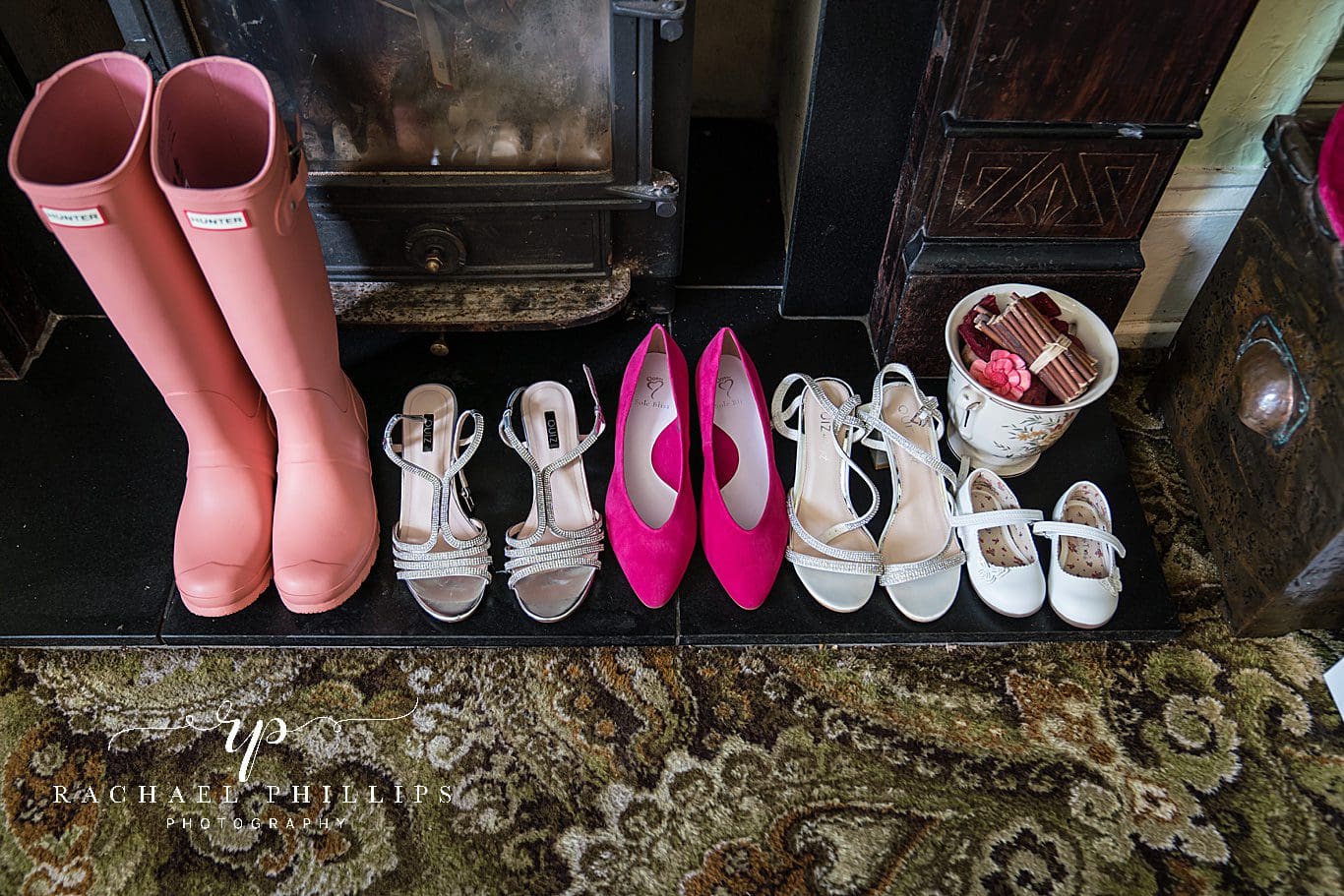 the bridal footwear collection. hunter pink wellies, to silver shoes along with dainty flower girls little shoes.