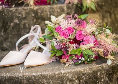 the brides shoes and flowers