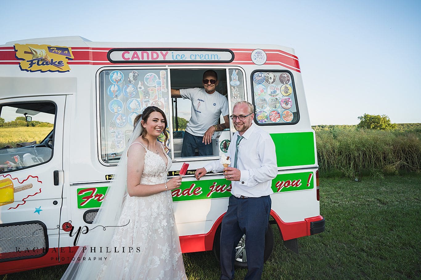 bride and groom outside the ice cream van on there wedding day eating ice-cream.