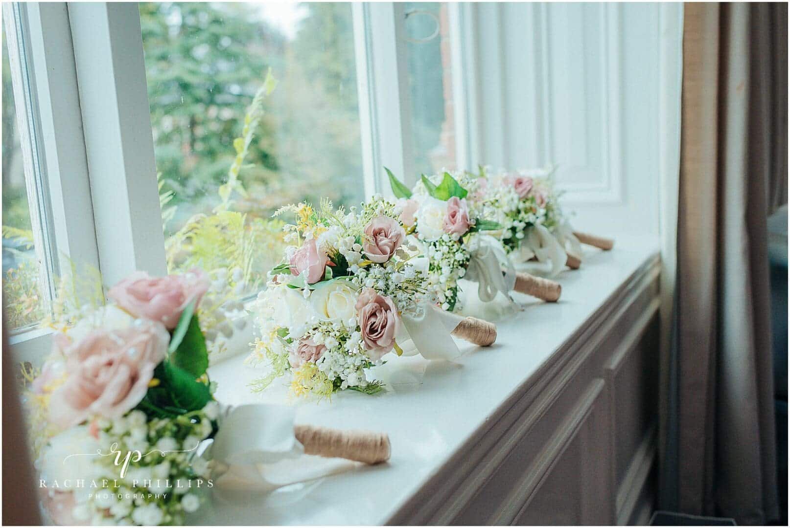 Beautiful wedding flowers on a window ledge
