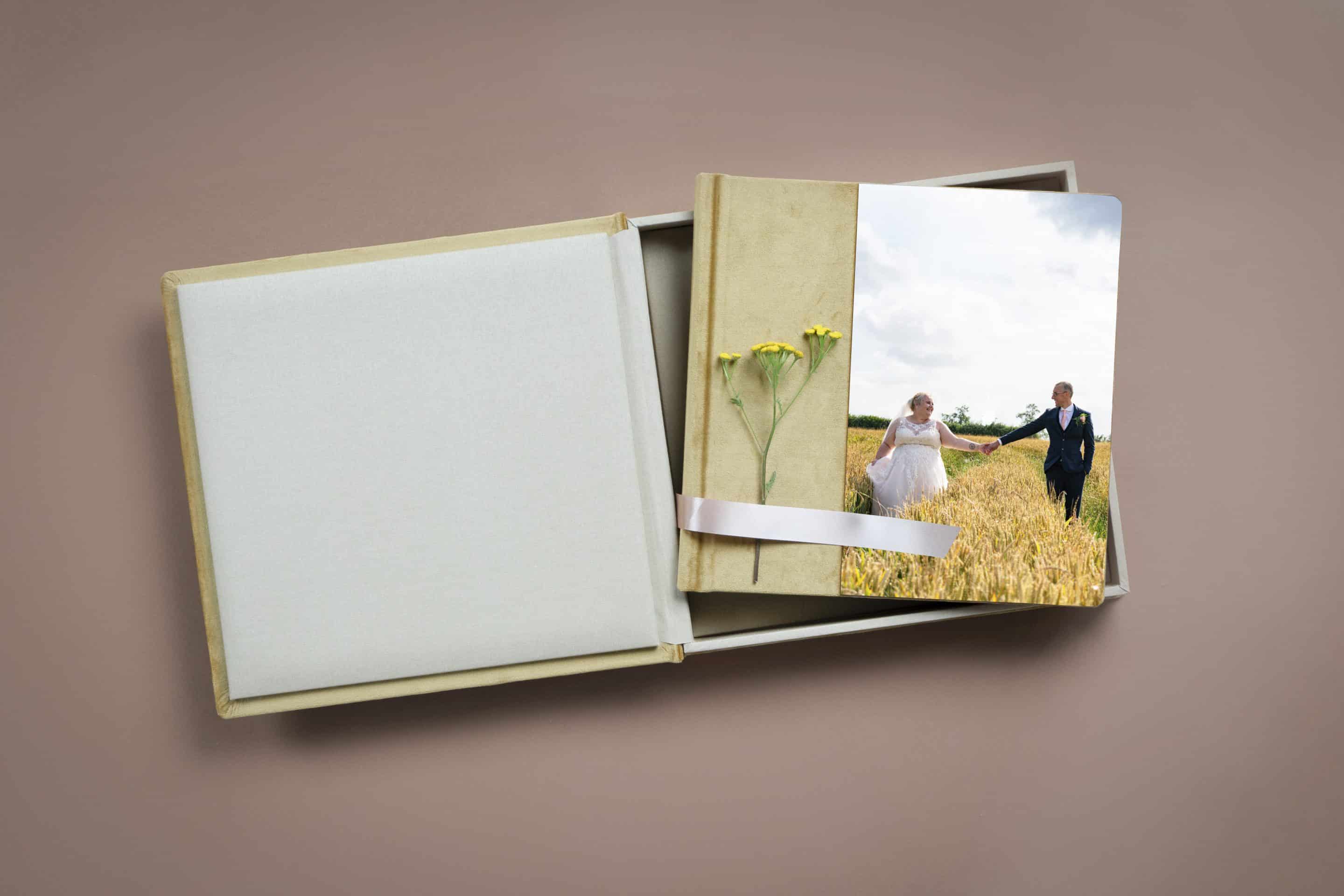 A blue wedding album with an acrylic front